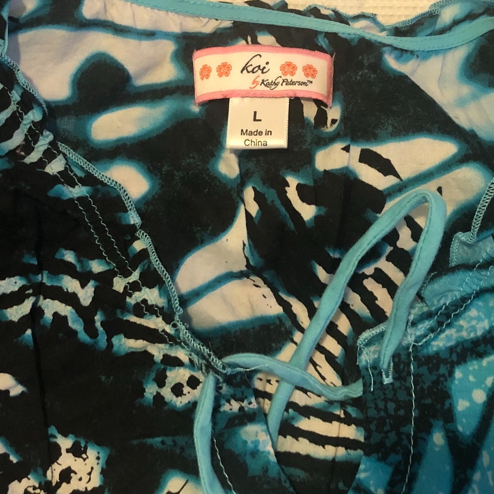 Koi scrub top